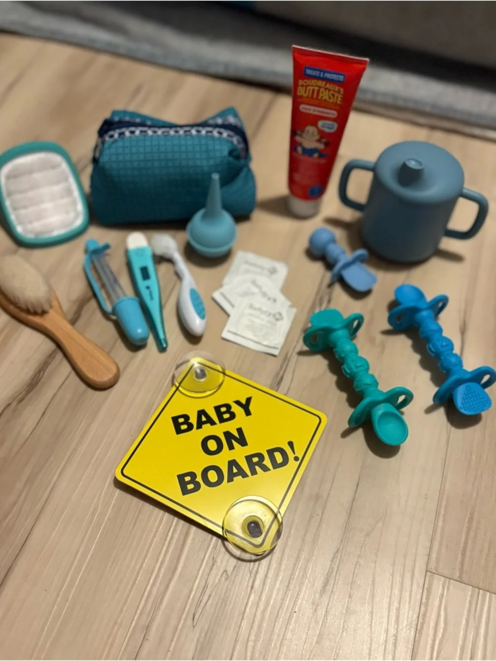 Baby Bundle including Baby On Board Car Window Sign, brushes, first aid travel